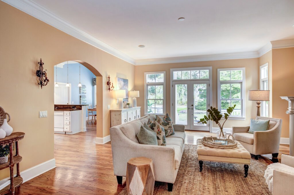 Staged living room photo Huntsville — professionally staged interior with neutral tones