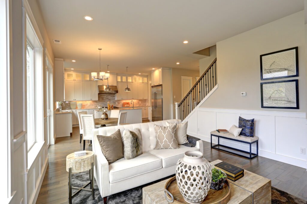 Staged living room photo Huntsville — bright professionally staged North Alabama home interior with neutral tones and natural light